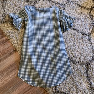 Light blue gingham dress with ruffle sleeves.